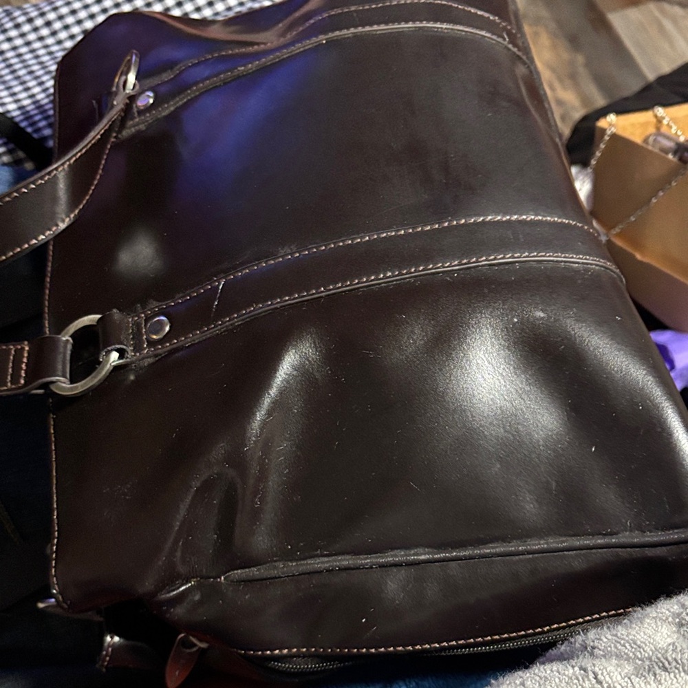 Franklin Covey Dark Brown Leather Briefcase
Measurements: Width:18
Lengths: 12